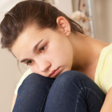 Photo of Elissa, a 16-year-old girl, looking sad